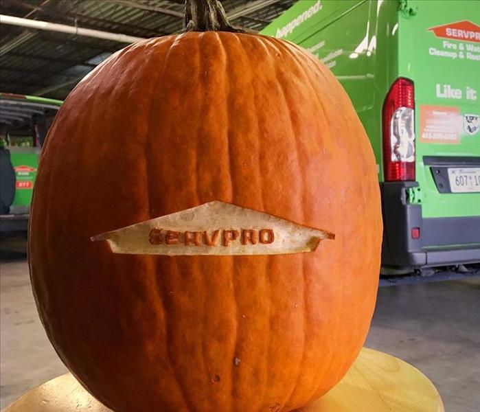 Pumpkin carved with SERVPRO logo